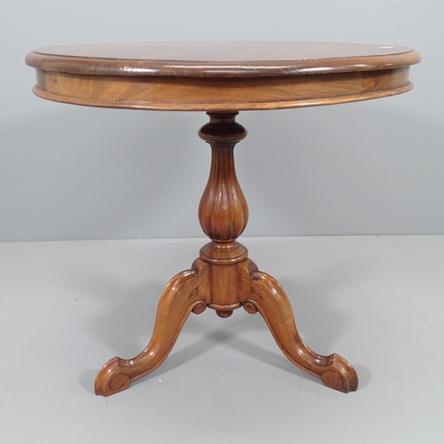 2193 - An antique mahogany circular occasional table on tripod base. 70x65cm