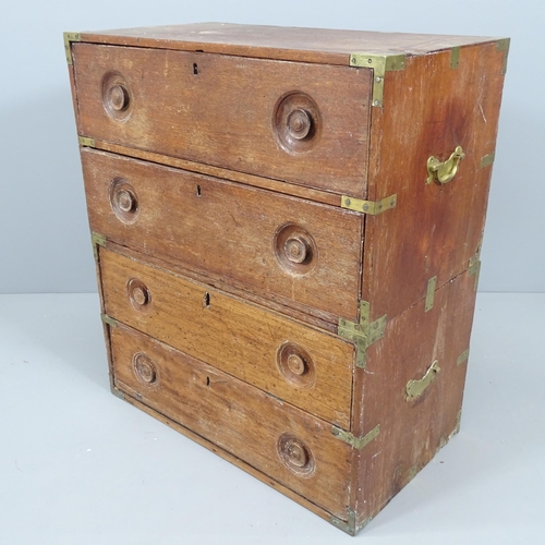 2202 - An antique two-section campaign chest of four drawers, with brass mounts. 73x81x40cm.