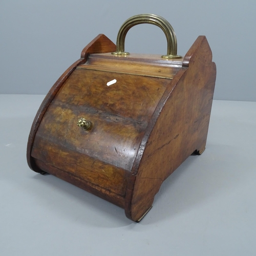 2219 - An antique mahogany and brass mounted coal scuttle. 34x40x47cm