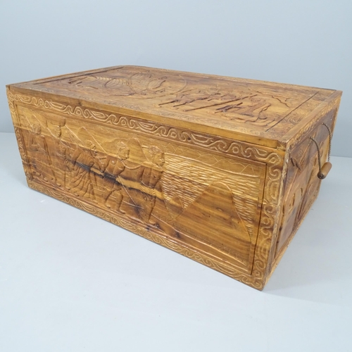 2220 - A large carved hardwood chest. 115x47x67cm