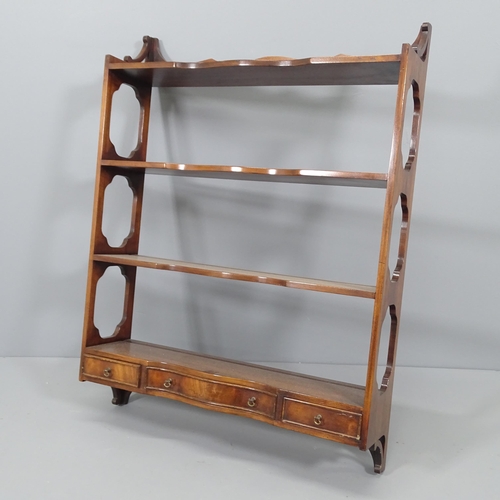 2222 - A 19th century mahogany four-tier hanging bookshelf with three frieze drawers. 69x91x18cm.