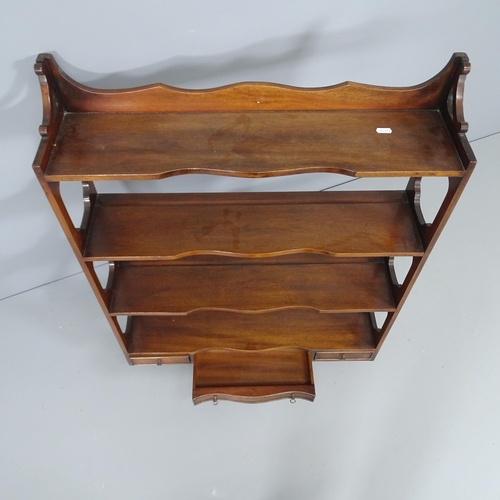 2222 - A 19th century mahogany four-tier hanging bookshelf with three frieze drawers. 69x91x18cm.