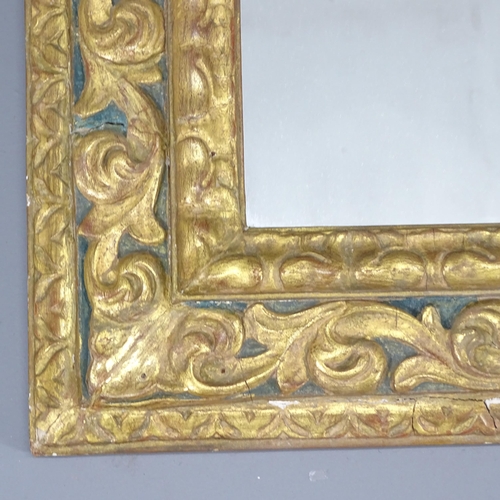 2234 - A continental gilt painted wall mirror, with applied carved decoration. 96x103x6cm.