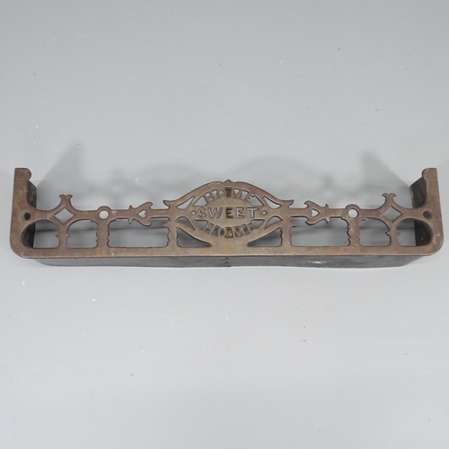 2238 - A Victorian Arts & Crafts cast-iron fire fender, inscribed 