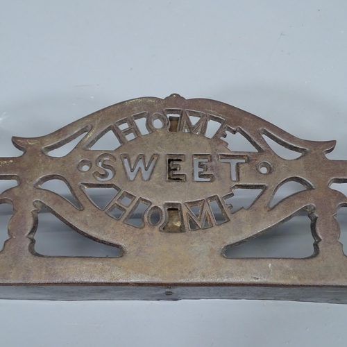 2238 - A Victorian Arts & Crafts cast-iron fire fender, inscribed 