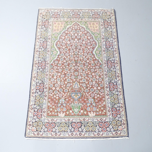 2250 - A Persian cream-ground silk prayer rug. 122x77cm.