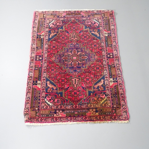 2252 - A red-ground Baluchi rug. 155x107cm