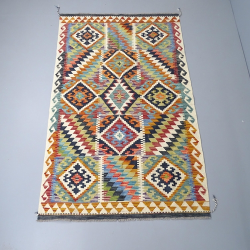 2263 - A Chobi Kilim rug. 197x121cm