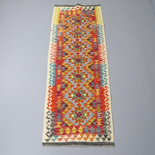 2266 - A Chobi Kilim runner. 197x67cm