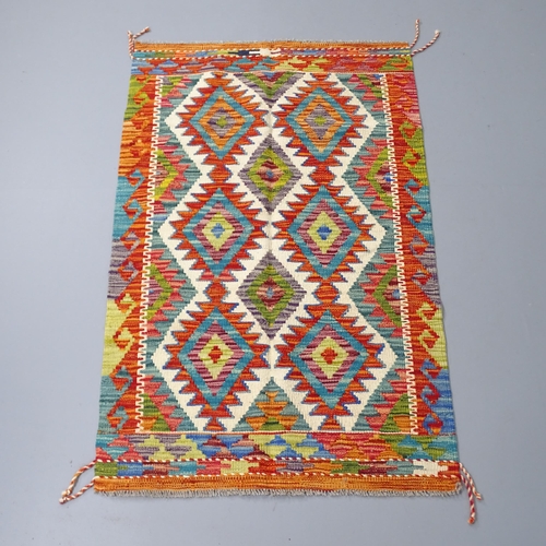 2268 - A Chobi Kilim rug. 132x85cm