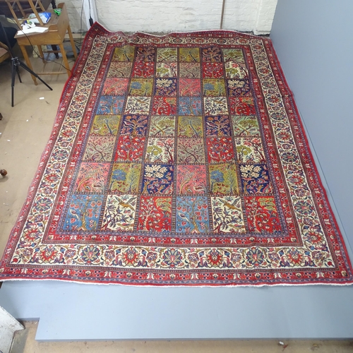 2279 - A red-ground Bakhtiar carpet. 350x250cm.