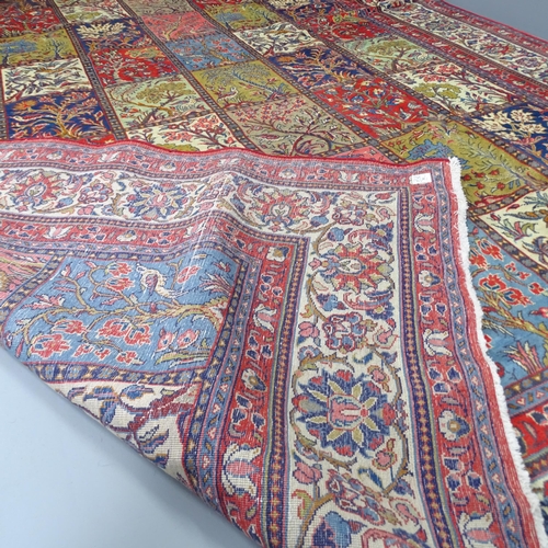 2279 - A red-ground Bakhtiar carpet. 350x250cm.