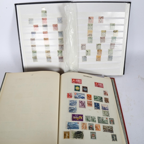 71 - 2 stamp albums, 1 containing various Nederland stamps, including Red 10c, Blue 5c, and various other... 