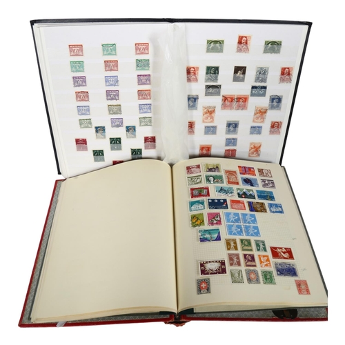 71 - 2 stamp albums, 1 containing various Nederland stamps, including Red 10c, Blue 5c, and various other... 