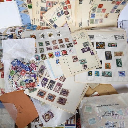 85 - A box of loose and sheeted world stamps