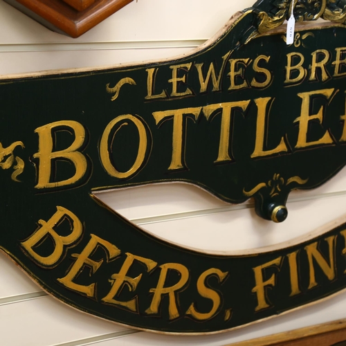 578 - A painted wooden sign advertising Lewes Brewery, L124cm