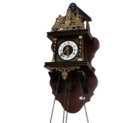 580 - A Continental wall clock with ornate brass mounts, and weights, height approx 50cm