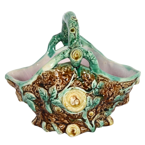 619 - Antique Majolica basket with bird's nest decoration, H22cm