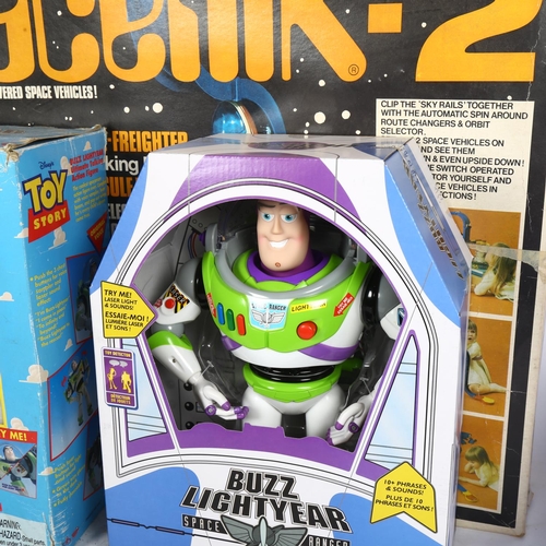 631 - A Vintage Buzz Lightyear interactive talking figure, boxed in original packaging, and a second boxed... 