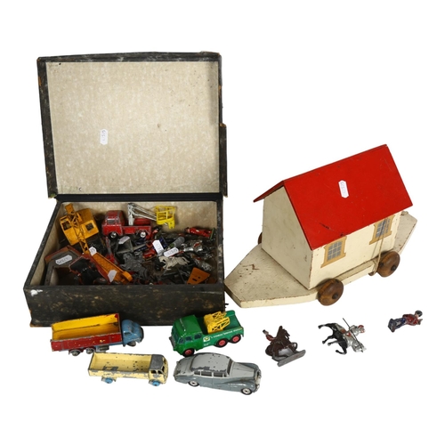 634 - A Vintage wooden pull-along Noah's Ark, with wooden animal figurines, and a quantity of Dinky vehicl... 