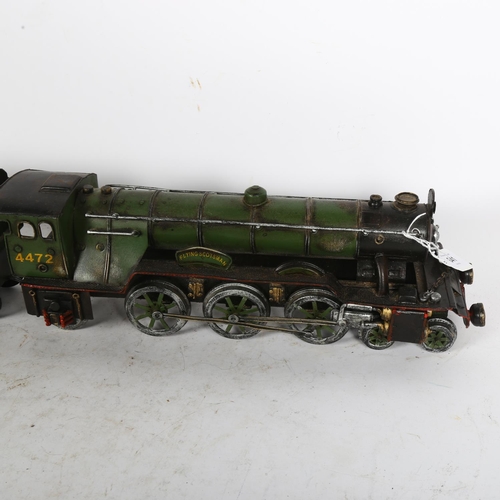 641 - A tinplate Flying Scotsman model with LNER tender, reference on front of locomotive 4472, length inc... 