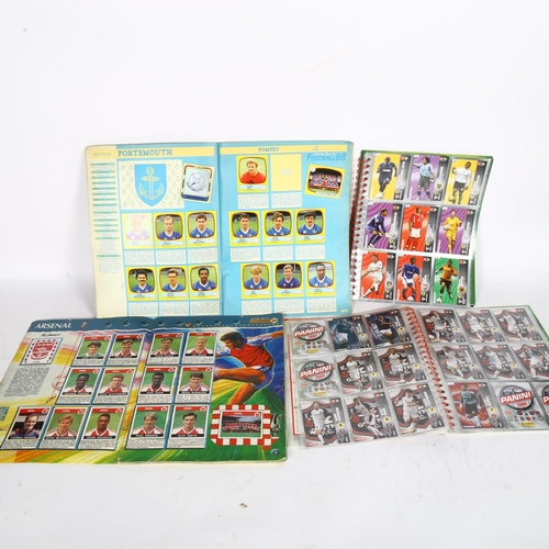 665 - A quantity of various Panini sticker and card albums, all football related, including Panini's Footb... 