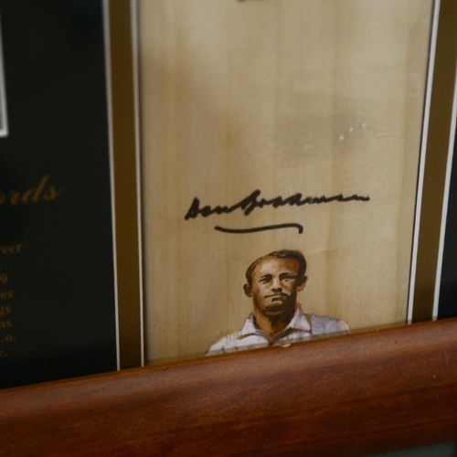 680 - Sir Donald Bradman cricket bat, and pictures, framed, H115cm overall, letter of authenticity, etc