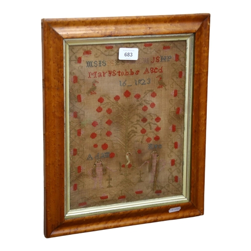 683 - A Georgian cross-stitch sampler by Mary Stubbs aged 16 - 1823, maple frame, H40cm overall