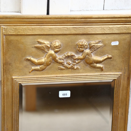 685 - A gilt-framed bevel-edge wall mirror, with design of cherubs, H1m, and 2 arch-top similar smaller mi... 