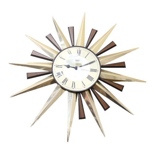 687 - Vintage quartz sunburst wall clock, 55cm overall