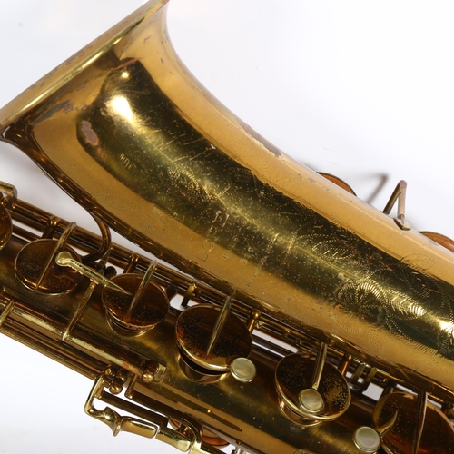 690 - A brass tenor saxophone by Dore of Paris, cased