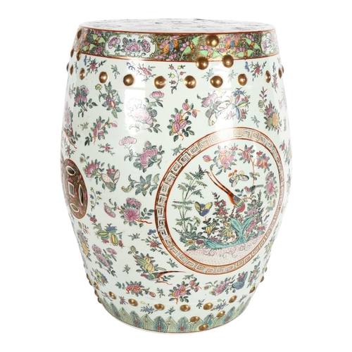 695 - A Chinese ceramic barrel design garden seat, with butterfly and floral decoration, H48cm