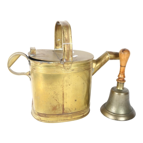 706 - Antique brass hot water can, H34cm, and a brass bell with turned wood handle