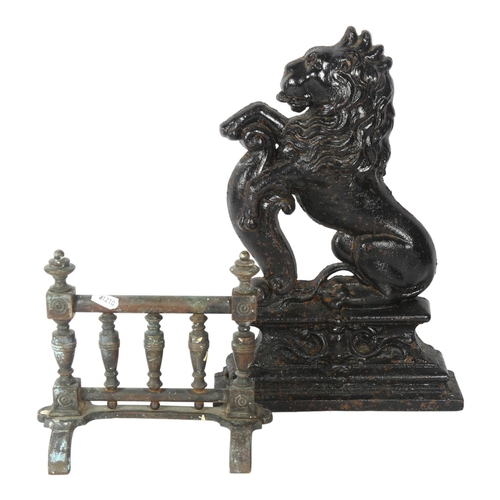 710 - Antique cast-iron lion figure doorstop, 39cm, and a smaller brass doorstop