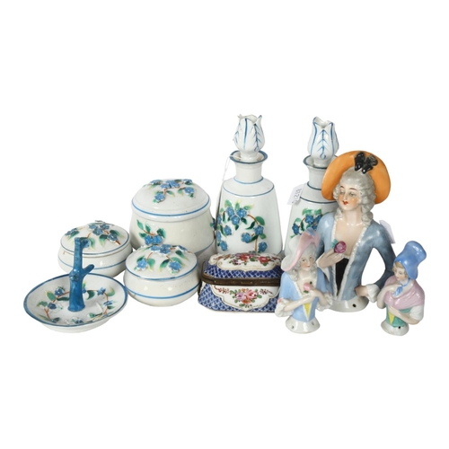 715 - A Chinese porcelain box, L8cm, and 3 pin cushion dolls