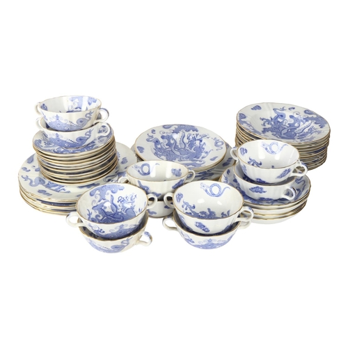 718 - Royal Worcester porcelain dinnerware, with blue dragon decoration