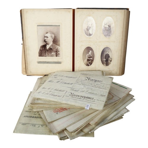 721 - 19th century conveyancing documents, and a Victorian family photograph album awarded as a prize in 1... 