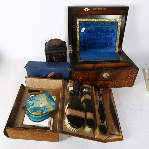 736 - A Victorian walnut writing slope, with inlaid decoration, 30cm across, leather-cased Vintage travel ... 