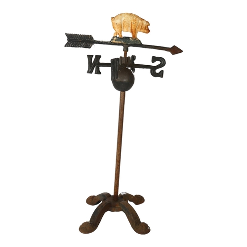 741 - A cast-iron weather vane on quadruple support, H77cm