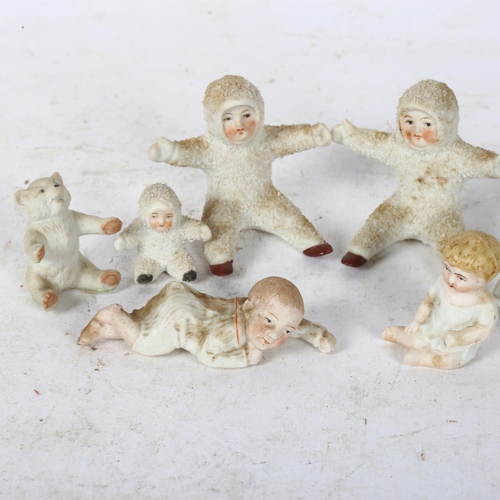 753 - 2 pairs of miniature snowbabies, tallest 5cm, 3 miniature dolls and a teddy bear