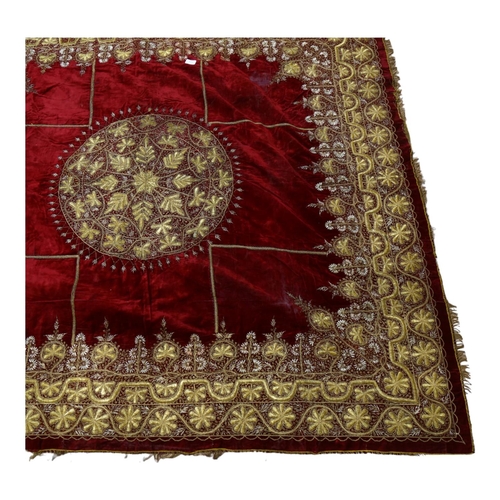 771 - Ornate gold and silver wirework on red velvet throw, with floral design, 177cm x 164cm