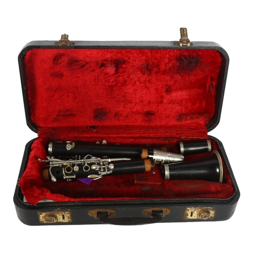 772 - A clarinet with plated mounts, cased