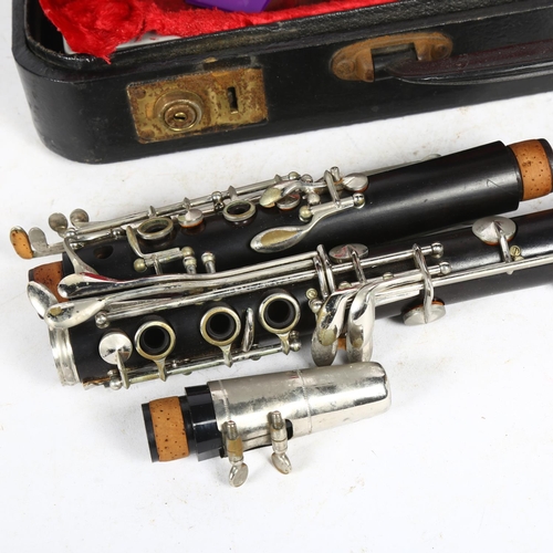 772 - A clarinet with plated mounts, cased