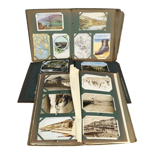 786 - A group of 3 interesting postcard albums containing cards from many UK and European cities and locat... 