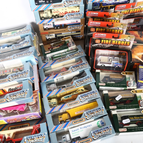 562 - A quantity of diecast boxed vehicles, including Matchbox Convoy, Matchbox Auto Transporter set, and ... 