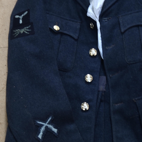 564 - A Vintage RAF wool uniform jacket with sleeve badges, size 17