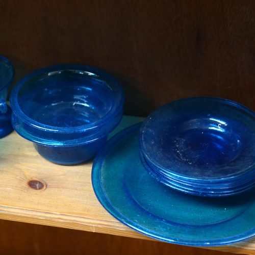 580 - A set of 6 blue bubble glass 2-handled cups, 4 matching saucers, plate and 2 bowls