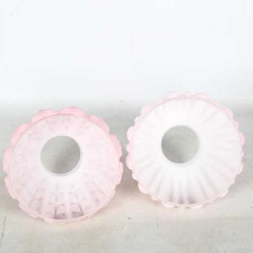 585 - 2 Victorian fluted ruby tinted oil lamp shades, largest diameter 15cm