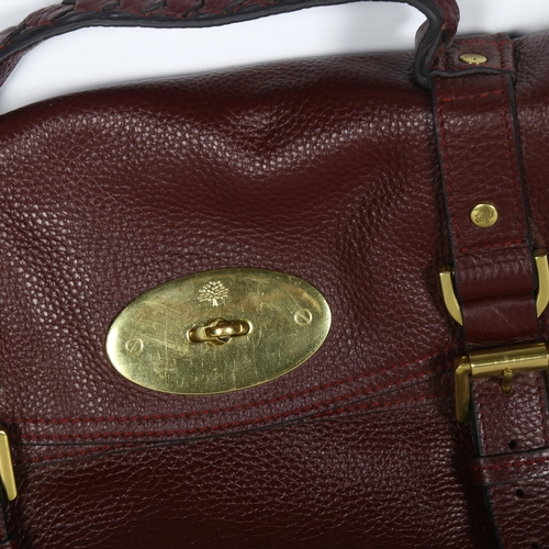 595 - Vintage Mulberry burgundy leather bag with brass fittings, W32cm