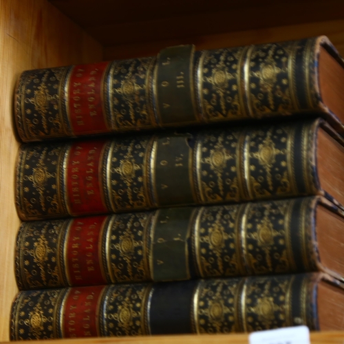 597 - A set of 4 half leather-bound 